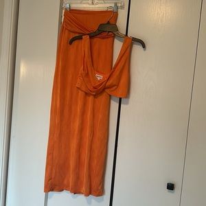 Tangerine colored 2 piece skirt set from the brand Superdown